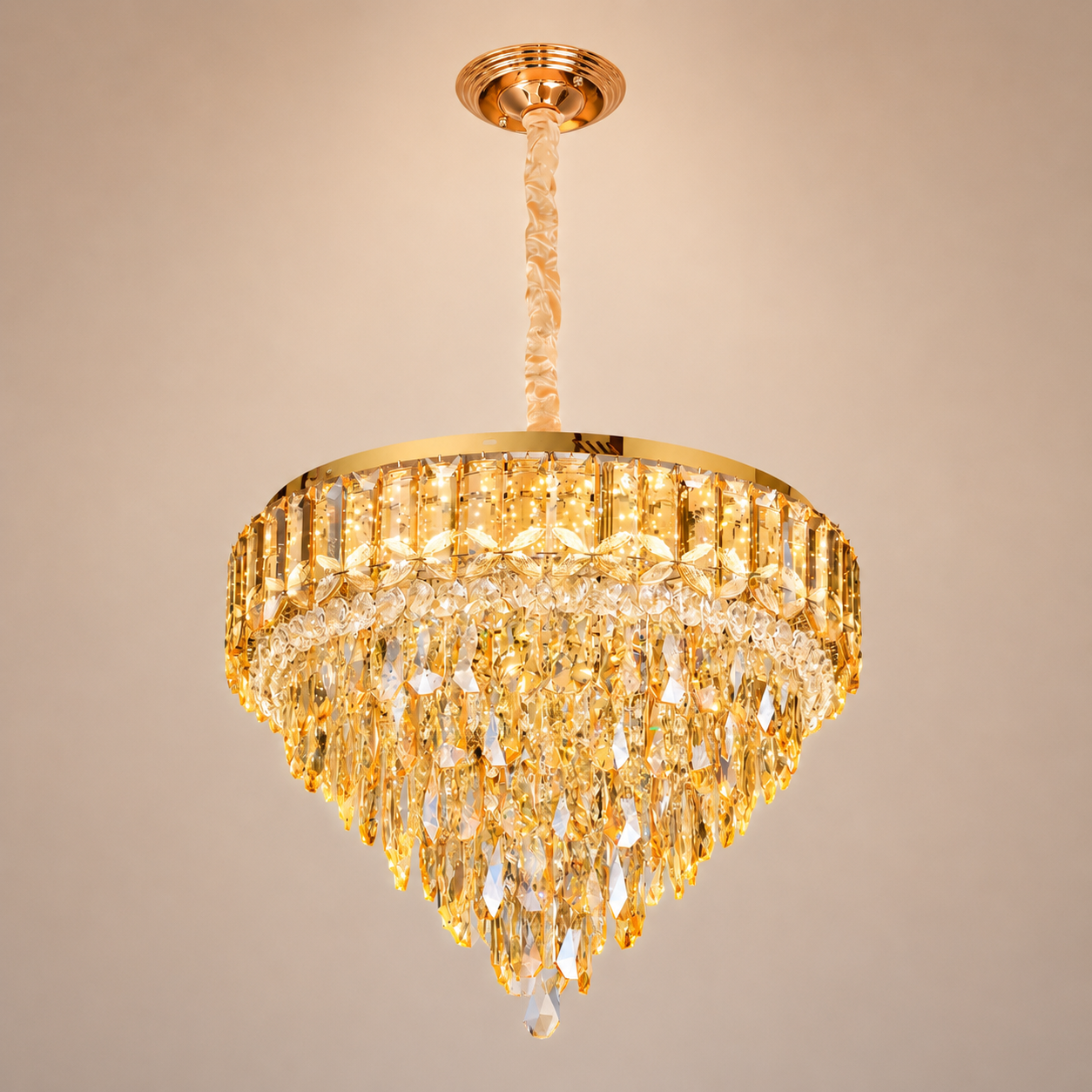 Royal Glow Crystal Chandelier with luxury gold finish and cascading crystal drops for elegant interior lighting.