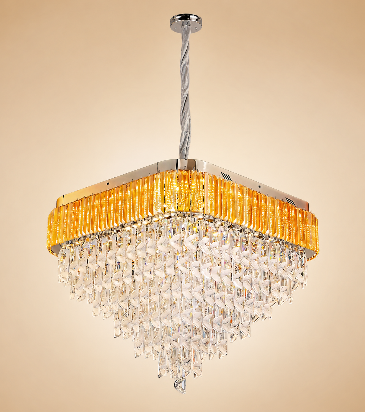 Aurora Luxe Crystal Cascade Chandelier with gold frame and cascading crystal design emitting warm ambient light.